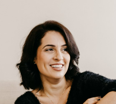 Smiling woman with short dark hair
